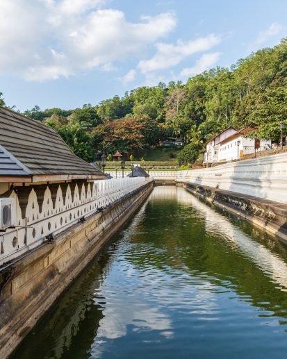 Scenic view of beautiful antique architecture with river in kandy, sri lanka